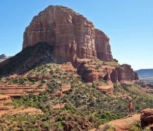 A Hiker Takes In The View On Bell Rock Trail